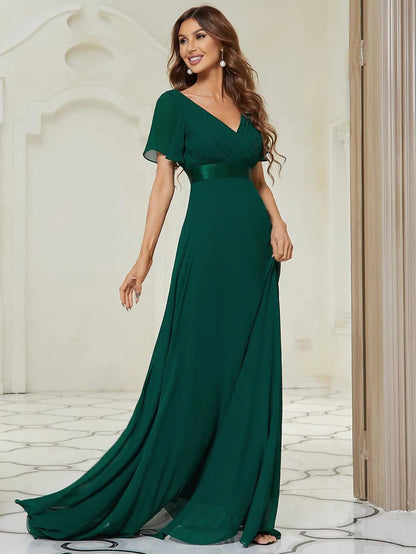 Wholesa Long Empire Waist Bridesmaid Dress with Short Flutter Sleeves