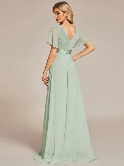 Wholesa Long Chiffon Empire Waist Bridesmaid Dress with Short Flutter Sleeves