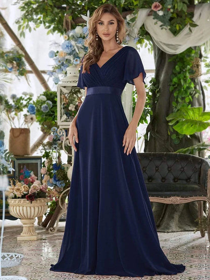 Wholesa Long Chiffon Empire Waist Bridesmaid Dress with Short Flutter Sleeves