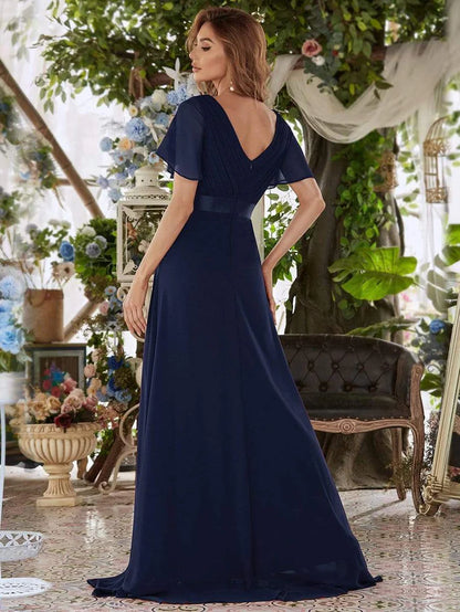 Wholesa Long Chiffon Empire Waist Bridesmaid Dress with Short Flutter Sleeves