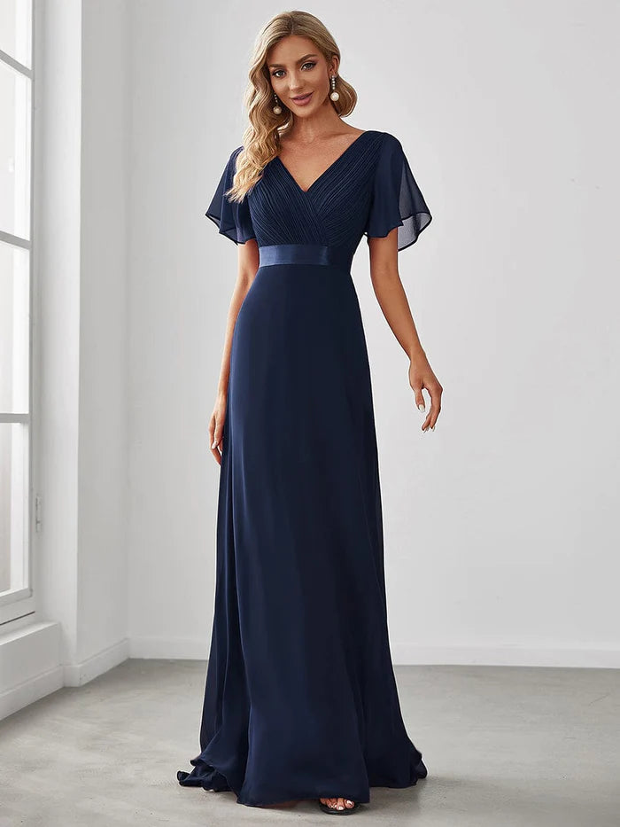 Wholesa Long Empire Waist Bridesmaid Dress with Short Flutter Sleeves