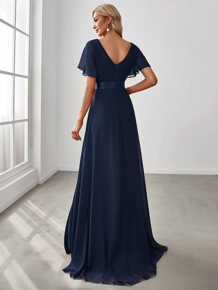 Wholesa Long Empire Waist Bridesmaid Dress with Short Flutter Sleeves