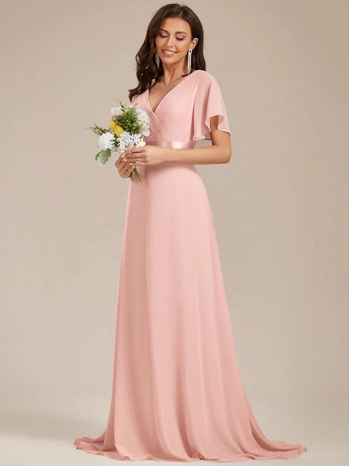 Wholesa Long Empire Waist Bridesmaid Dress with Short Flutter Sleeves